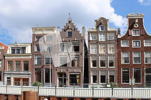 Image of Amsterdam downtown, Traditional old houses and a canals