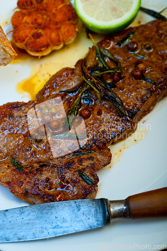 Image of roasted grilled ribeye beef steak butcher selection