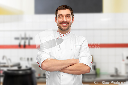 Image of happy smiling male chef with crossed arms