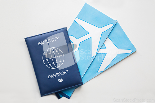 Image of immunity passport and air tickets for travel