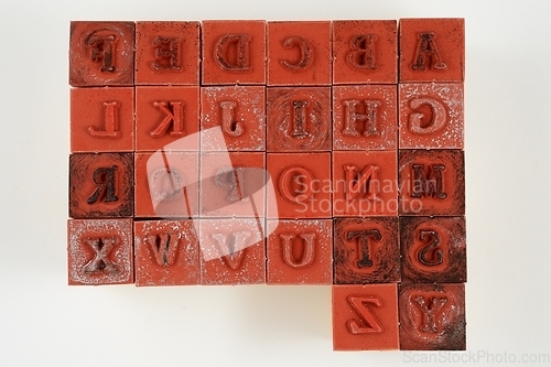 Image of rubber stamps of letters of the Latin alphabet 
