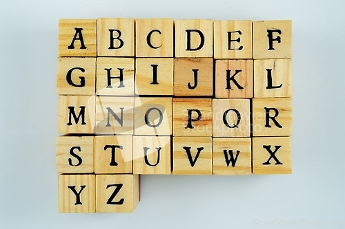 Image of letters of the latin alphabet on wooden cubes 