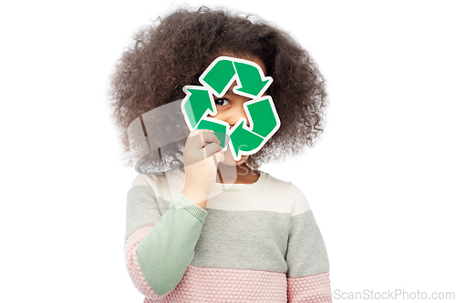 Image of african american girl holding green recycling sign