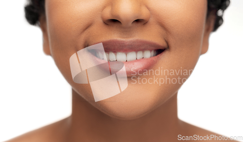 Image of close up of face of smiling african american woman