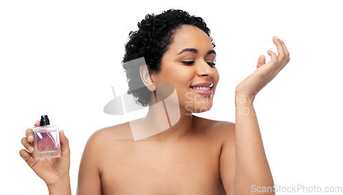 Image of young african american woman with perfume