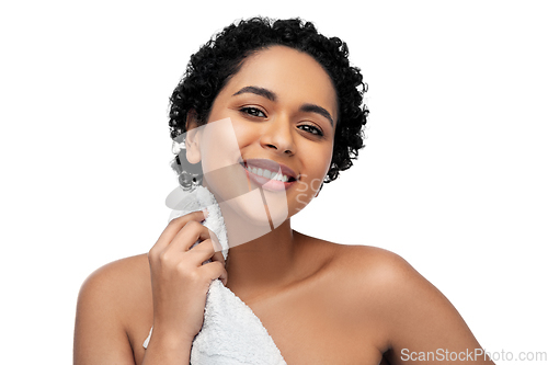 Image of young african american woman with bath towel