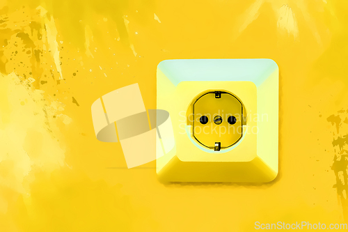 Image of Electric socket on bright yellow wall 