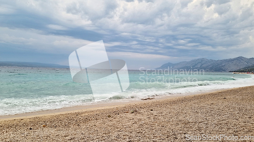 Image of Beautiful shore of the Adriatic Sea. Bay view with cloudscape