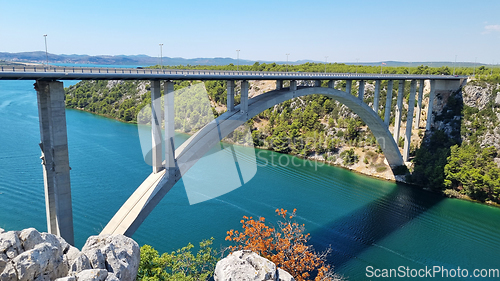 Image of Highway Krka Bridge over the Krka river, town of Skradin in background, Croatia