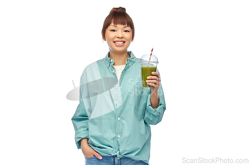 Image of happy smiling asian woman with can drink