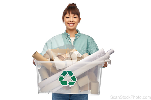 Image of happy smiling asian woman sorting paper waste