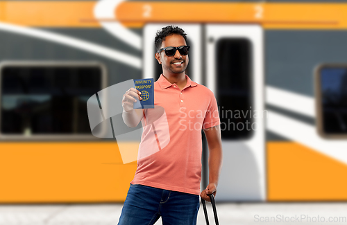 Image of happy man with air ticket and immunity passport