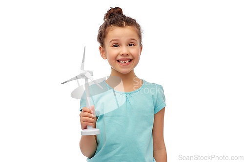 Image of smiling girl with toy wind turbine