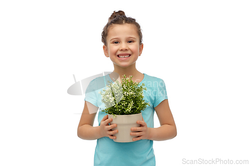 Image of happy smiling girl holding flower in pot