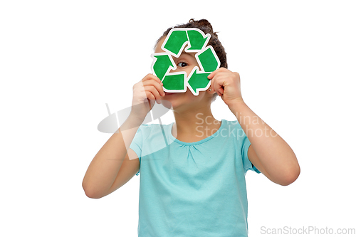 Image of curious girl looking through green recycling sign