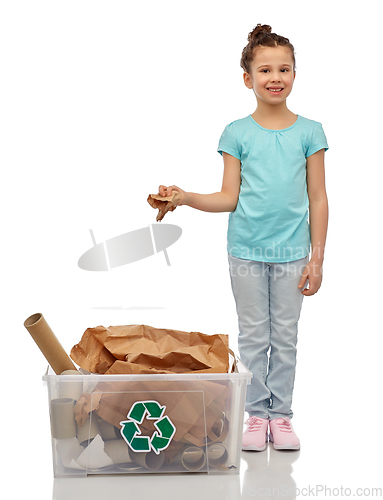 Image of smiling girl sorting paper waste