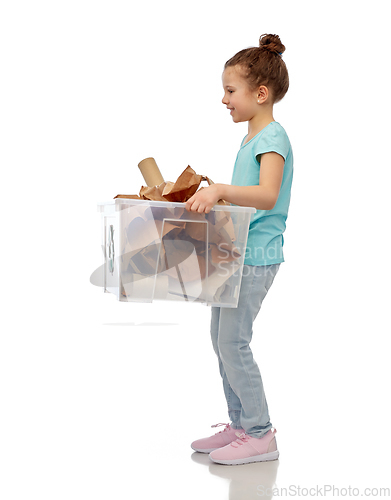 Image of smiling girl sorting paper waste