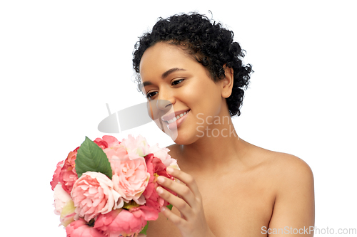 Image of portrait of african american woman with flowers