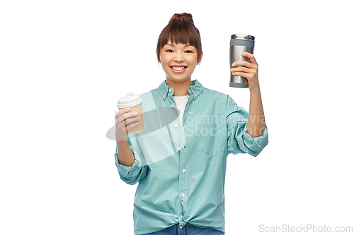 Image of woman with thermo cup or tumbler for hot drinks