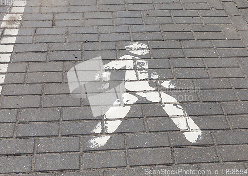 Image of painted on an old tile road