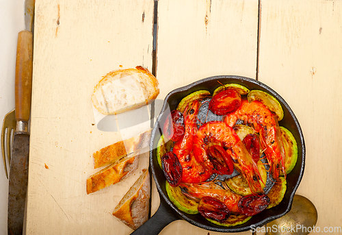 Image of roasted shrimps with zucchini and tomatoes