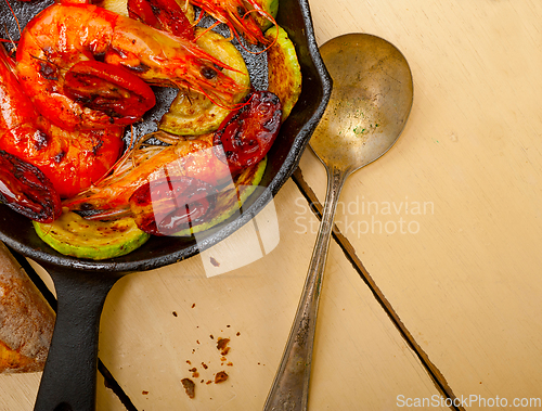 Image of roasted shrimps with zucchini and tomatoes