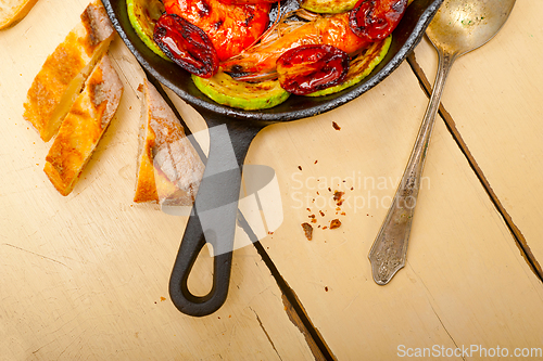 Image of roasted shrimps with zucchini and tomatoes