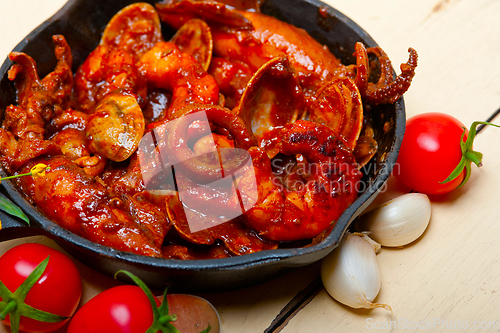 Image of fresh seafoos stew on an iron skillet