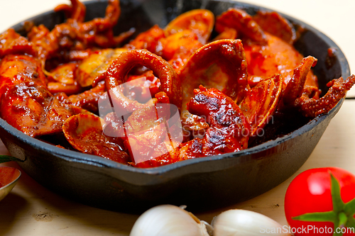 Image of fresh seafoos stew on an iron skillet