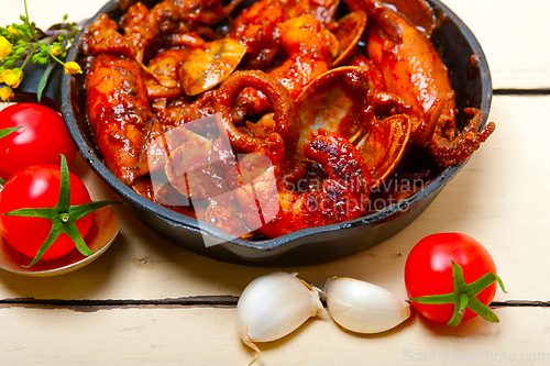 Image of fresh seafoos stew on an iron skillet