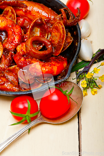 Image of fresh seafoos stew on an iron skillet