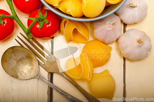 Image of Italian snail lumaconi pasta with tomatoes