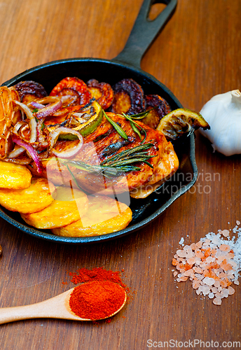 Image of roasted grilled BBQ chicken breast with herbs and spices