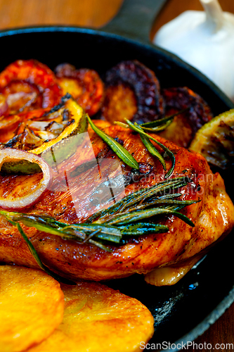 Image of roasted grilled BBQ chicken breast with herbs and spices