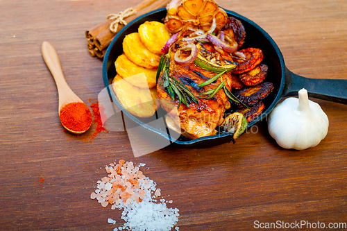 Image of roasted grilled BBQ chicken breast with herbs and spices