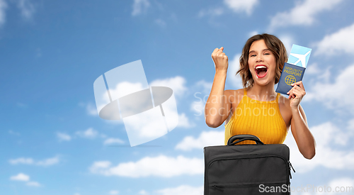 Image of happy woman with air ticket and immunity passport