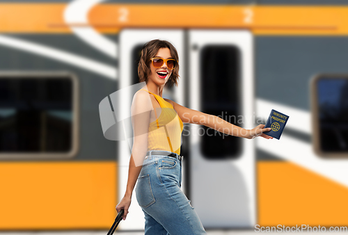 Image of happy woman with air ticket and immunity passport