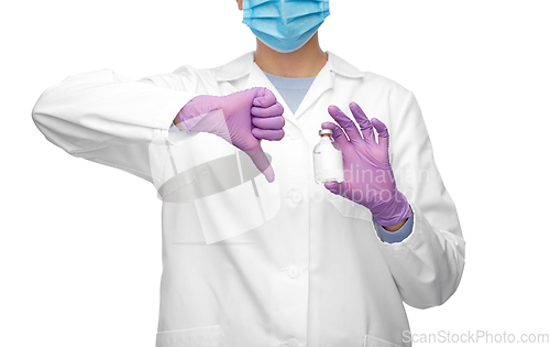 Image of close up of doctor with medicine shows thumbs down