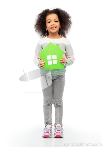 Image of smiling african girl holding green house icon