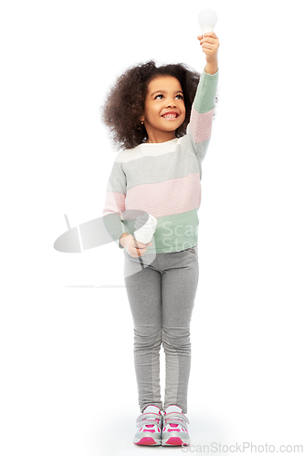 Image of african american girl with different light bulbs