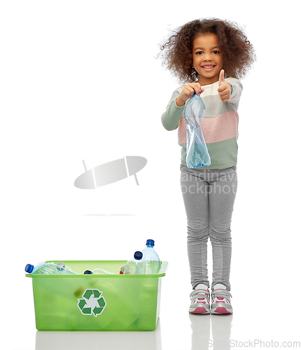 Image of happy african american girl sorting plastic waste