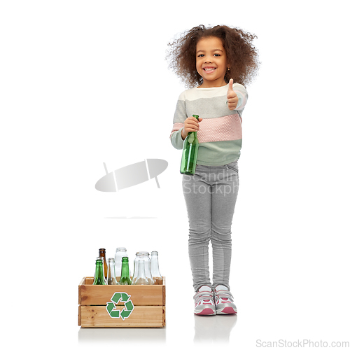 Image of smiling girl with wooden box sorting glass waste