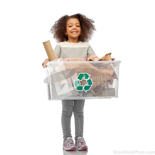 Image of smiling african american girl sorting paper waste