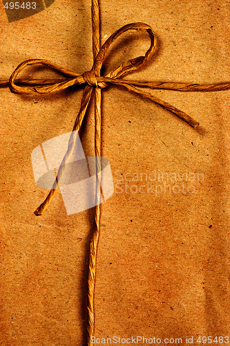 Image of Rope ribbon tied on paper background