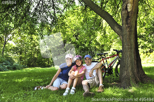 Image of Family resting in a park