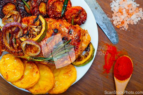 Image of roasted grilled BBQ chicken breast with herbs and spices