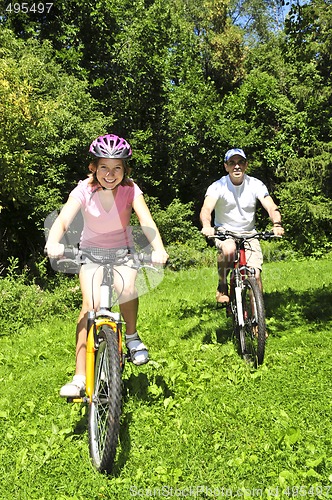 Image of Family riding bicycles