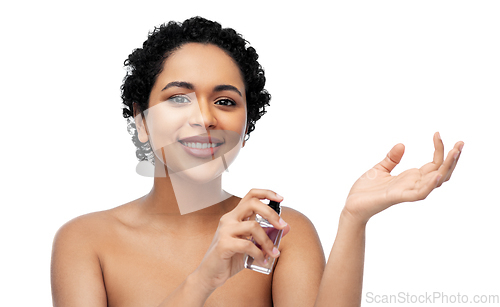 Image of young african american woman with perfume