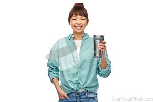 Image of woman with thermo cup or tumbler for hot drinks