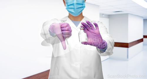 Image of close up of doctor with medicine shows thumbs down